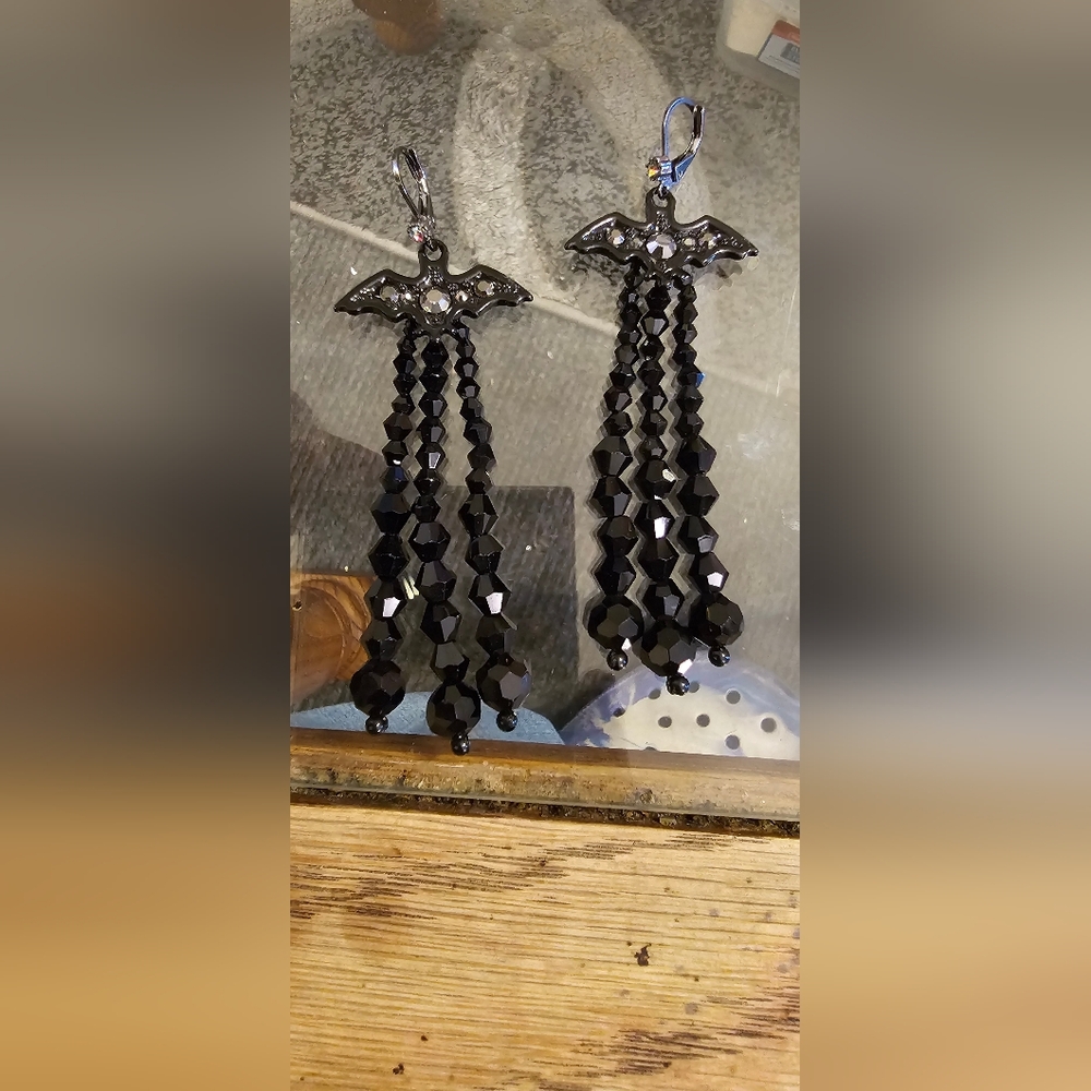 Brand new bat diamon dangling earrings